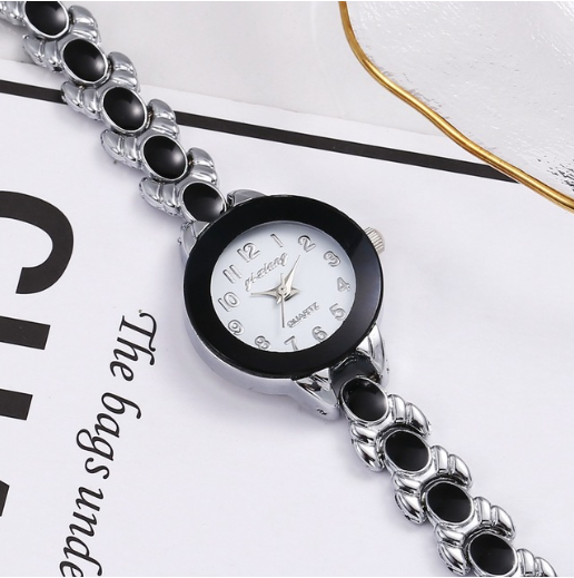 Montre métal pour femmes argent et noir